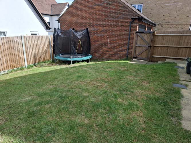 Rejuvenate sloping garden with new patio, terrace, borders and raised bed