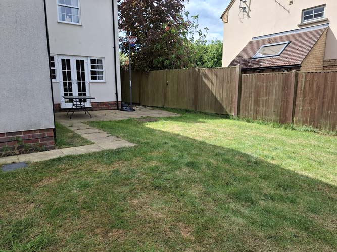 Rejuvenate sloping garden with new patio, terrace, borders and raised bed