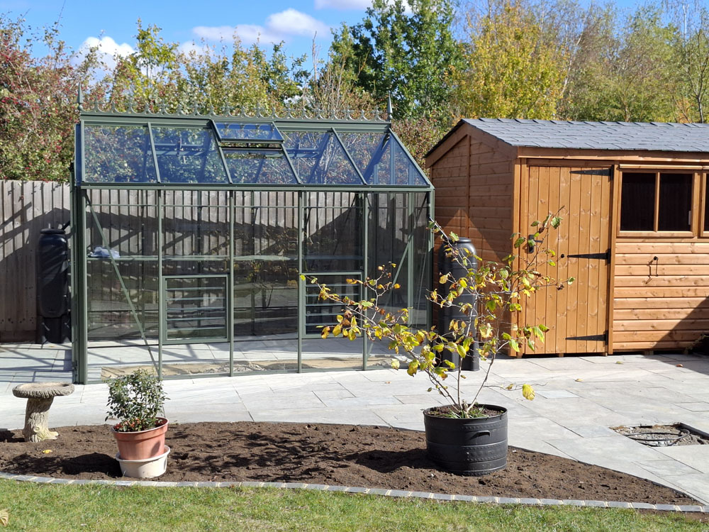 In progress… Large New Build makeover Curved lawn, borders including shed and greenhouse