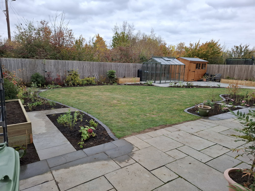 Large New Build makeover Curved lawn, borders including shed and greenhouse