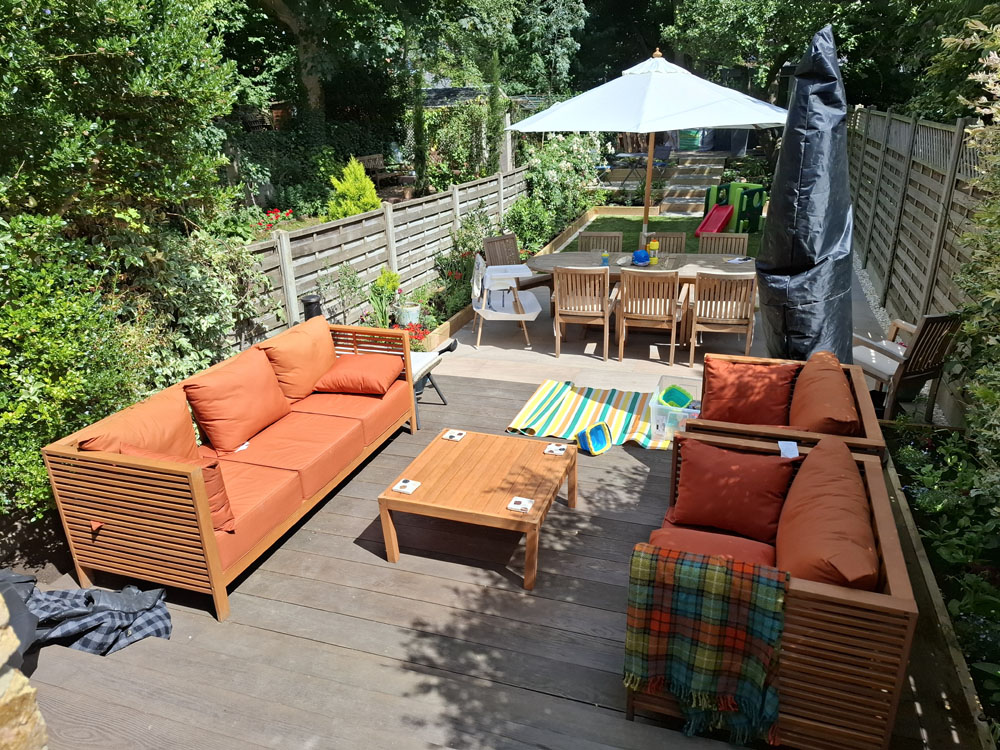 Narrow garden makeover with new patio, steps, raised beds and lawn