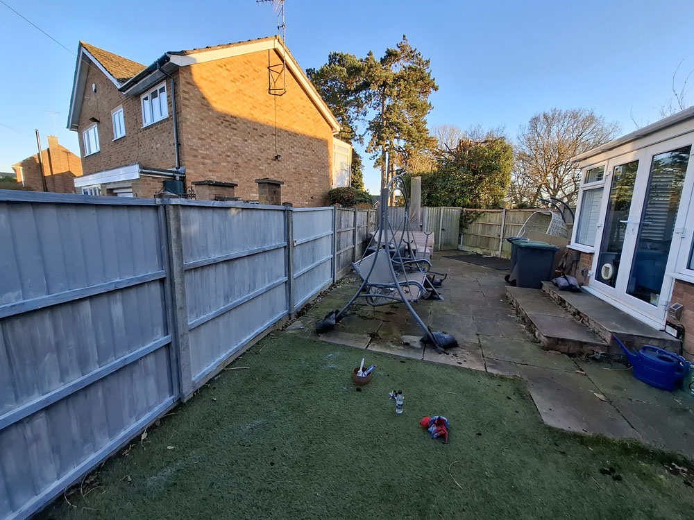 New patio, smaller artificial lawn, low maintenance