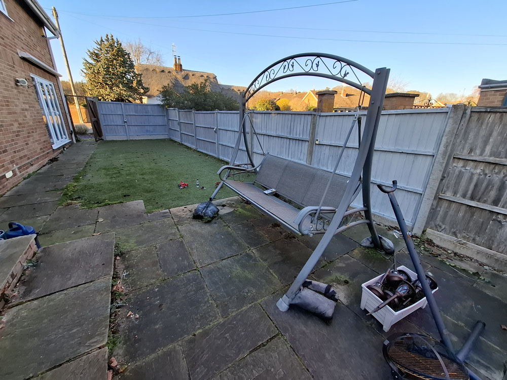 New patio, smaller artificial lawn, low maintenance